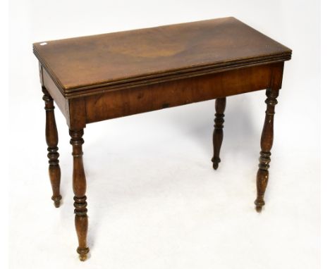 A late 19th century mahogany rectangular topped fold-over card table on turned tapering legs, 74 x 85 x 42.5cm.