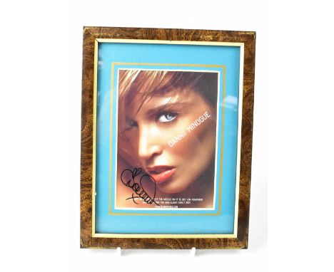 ROCK & POP; a group of five autographed promotional pictures of Dannii Minogue, Kylie Minogue, Status Quo, all band members, 