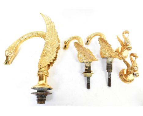A large and impressive gold plated swan form bathroom set, to include a bath spout in the form of a swan's head and wings, he