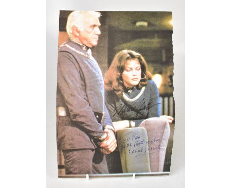 BATTLESTAR GALACTICA; a torn page from a magazine bearing twin signatures of the actors including Lorne Green.We have not aut