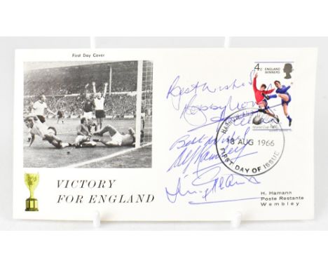 ENGLAND WORLD CUP WINNERS 1966; a first day cover bearing the signatures of Bobby Moore, Alf Ramsey and Jimmy Greaves.We have