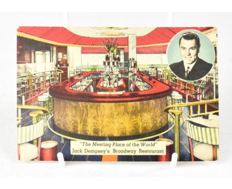 BOXING HISTORY; a photographic postcard bearing the signature of boxing great Jack Dempsey to the reverse.We have not authent