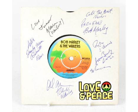 BOB MARLEY & THE WAILERS; a 7" single 'Jamming/Punky Reggae Party', bearing several signatures including Bob Marley to the sl