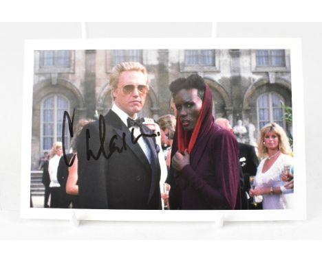 CHRISTOPHER WALKDEN; a James Bond promotional postcard bearing the actor's signature.We have not authenticated this signature