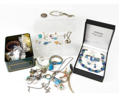 A quantity of costume jewellery to include modern enamelled items including butterfly brooch, a hinged bangle, also an Adrina