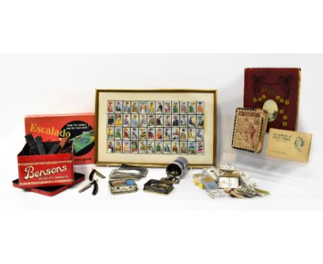 A collectors' lot to include a vintage boxed 'Escalado' race game, a large quantity of cigarette cards, many sets in their or