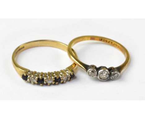 Two gold dress rings to include an 18ct gold ring, with three small collet set diamonds in platinum mounts, on an 18ct gold s