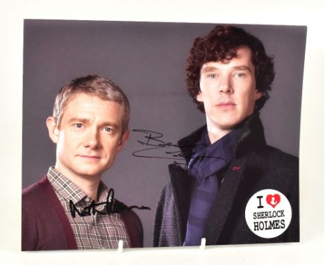 SHERLOCK; a coloured photograph bearing the signatures of Benedict Cumberbatch and Martin Freeman, 20 x 25cm.We have not auth