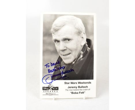 STAR WARS; a black and white promotional photograph bearing the signature of Jeremy Bullock, the man behind the mask of Boba 