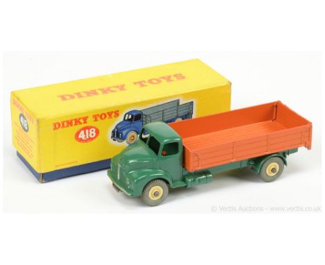 Dinky 418 Leyland Comet Wagon with hinged tailboard - green cab &amp; chassis, orange back, silver trim, light beige Supertoy