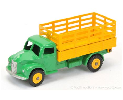 Dinky 343 (30n) Dodge Farm Produce Wagon - mid-green cab and chassis, yellow stake back and plastic hubs with treaded tyres, 