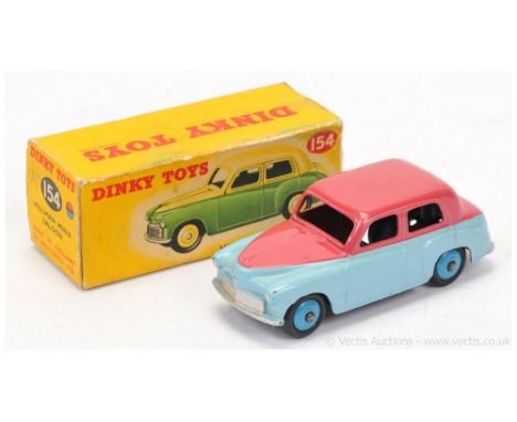 Dinky 154 Hillman Minx Saloon - two-tone pale blue, cerise, sliver trim, mid-blue ridged hubs with smooth tyres - Good Plus s