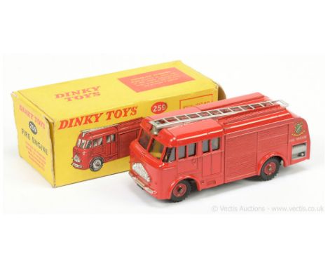 Dinky 259 Fire Engine late issue - finished in red including plastic hubs, with windows, silver trim, chrome ladders - overal