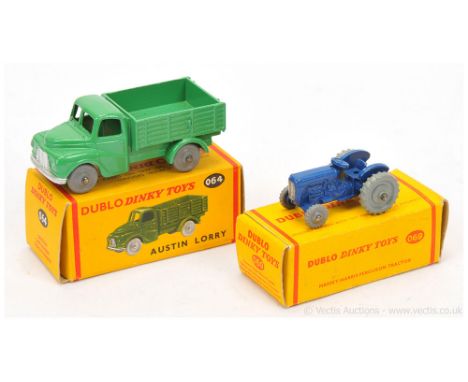 Dinky (Dublo Dinky) 064 Austin Open Back Lorry - green, silver trim, solid smooth grey plastic wheels - Mint in an Excellent 