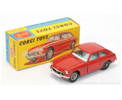 Corgi 327 MGB GT - red body, pale blue interior with black luggage case, wire wheels, chrome trim - Good Plus still a lovely 
