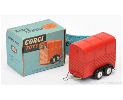 Corgi 102 Rice's Pony Trailer - red, black chassis, flat spun hubs, metal drawbar, with pony figure and inner packing piece -