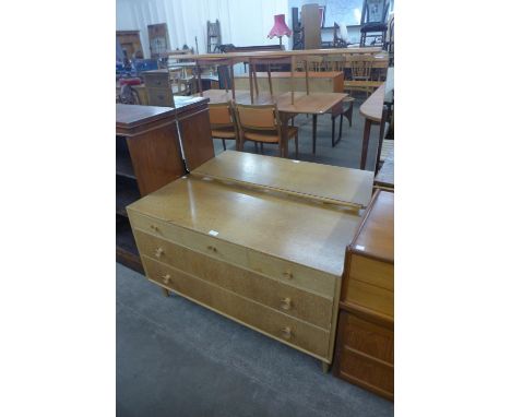 A light oak dressing chest 