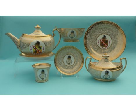 A Chamberlains Worcester tea service comprising an oval teapot, cover and stand, an oval twin handled tureen and cover, two 2