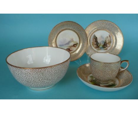 An English porcelain part tea set comprising a cup, two saucers, a side plate and a bowl, the saucers and plate each painted 