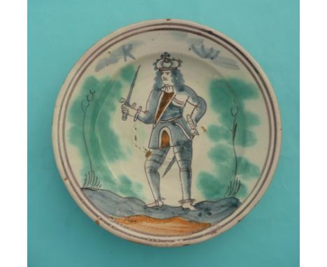 William III:  a polychrome English Delft dish stylishly painted in blue, orange, green and magenta with a full-length portrai