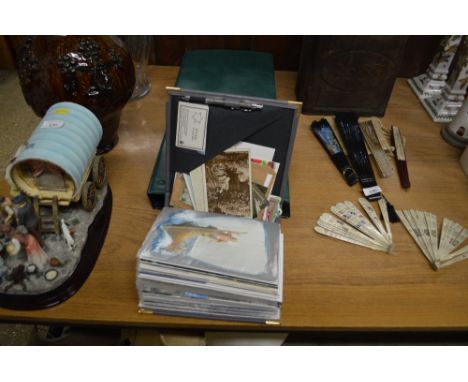 Three albums of various prints, First Day covers, post-cards etc. 