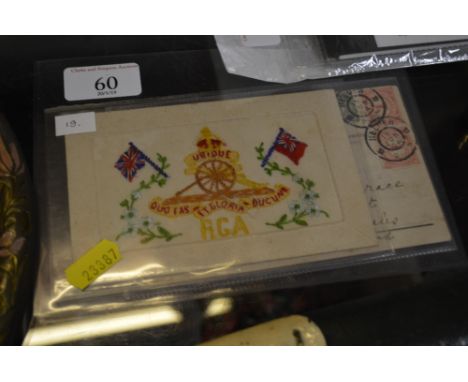 A WW1 silk embroidered patriotic post-card; and a 1904 hold-to-the-light warship post-card signed from SS Melrose Abbey