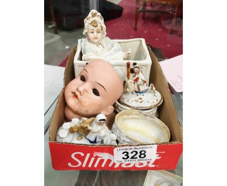 A collection of china including dolls head & trinket pot etc.
