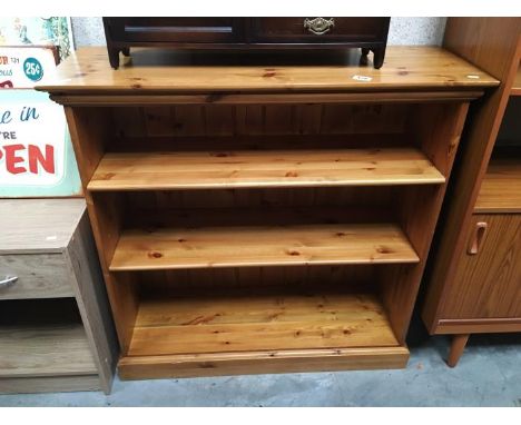A 3 shelf pine book case