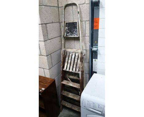 A small step ladder & a metal step ladder