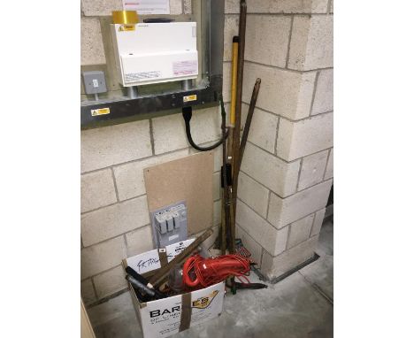 A quantity of garden tools including electric Flymo chainsaw