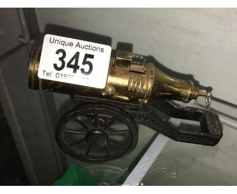 A vintage table lighter in form of a cannon