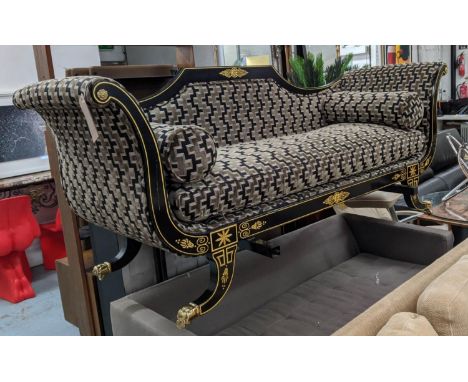 SOFA, approx 72cm x 142cm, Regency style, the ebonised showframe with gilt painted detail. 