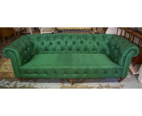 CHESTERFIELD SOFA, 70cm H x 222cm W x 93cm D, Victorian walnut in designer green fabric on castors. 