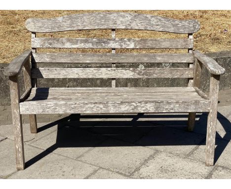 GARDEN BENCH, 126cm W, slated weathered teak,  arched back and flat top arms. 