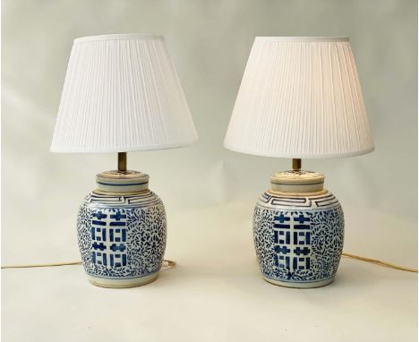 TABLE LAMPS, a pair Chinese ceramic blue and white lidded jar form, geometric panels with shades, 60cm H. (2) 