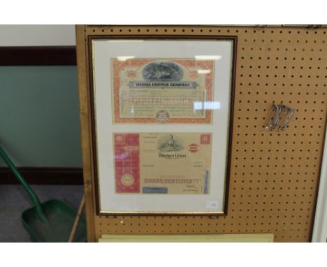 2 framed share certificates