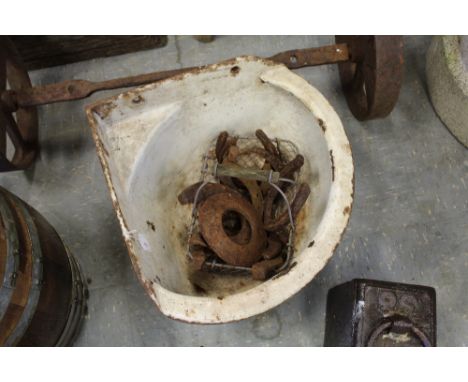 Cast corner feeding trough and horse shoes 