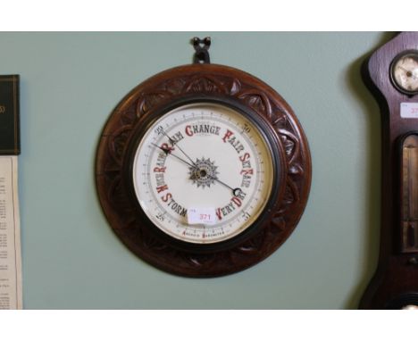 Large oak circular barometer