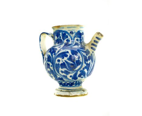 Spout officine maiolicare caltagironesi, XVIII Century, white enamel with blue decorations. H cm 20