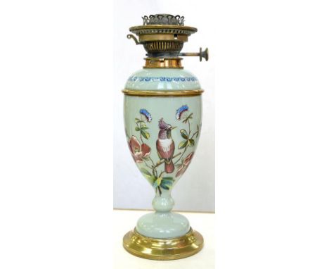 A VICTORIAN ENAMELLED CELADON COLOURED GLASS OIL LAMP AND BASE, OF SHIELD SHAPE WITH BRASS FOOT AND MOUNTS, ENAMELLED WITH A 