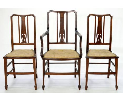 A SET OF THREE EDWARDIAN INLAID MAHOGANY CHAIRS, INCLUDING AN ELBOW CHAIR, A PAIR OF CAST IRON FIRE DOGS, 32CM H X 46CM DEEP 