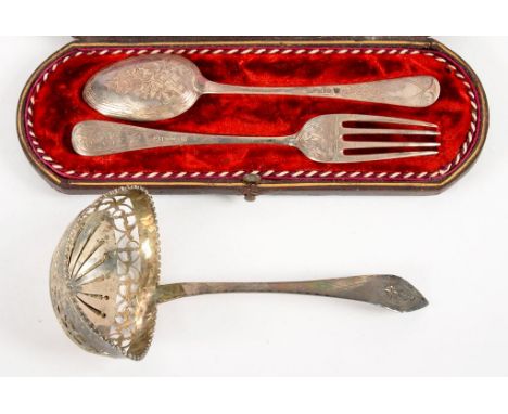 A VICTORIAN SILVER ENGRAVED SPOON AND FORK, SHEFFIELD 1882 AND 1887, CASED AND A DUTCH PIERCED SILVER LADLE, 2OZS 17DWTS 