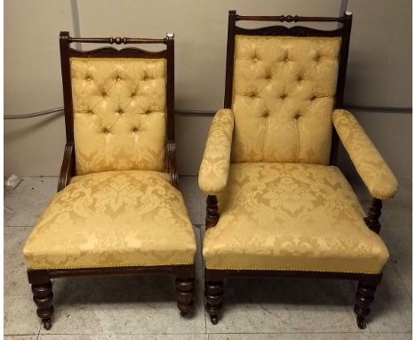 A pair of late 19th Century mahogany gentleman and lady's button backed chairs, yellow floral upholstery (2)
