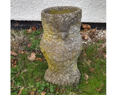 A stone planter in the form of an owl, 50 cm high