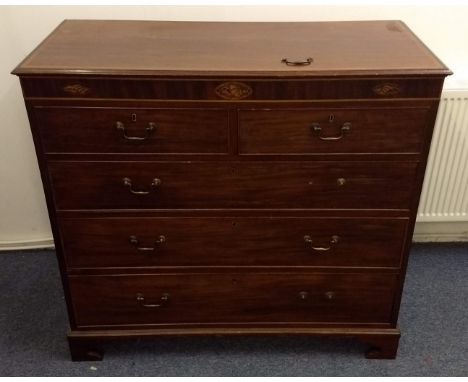 A 19th Century mahogany stung and inlaid chest-of-drawers, two short over three long drawers, inlaid shell decoration, bracke