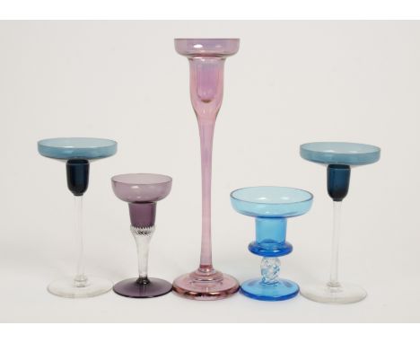 A small group of assorted saucer and pan topped candlesticks, one of heavy gauge in iridised pink, labelled 'Krosno' 27 cm, a