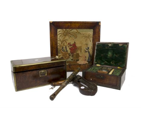 A 19th Century rosewood and oak, brass-bound writing slope, Bramah lock, fold out top, green leather insert and various compa