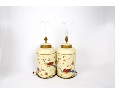 A pair of Woolpit Interiors of Suffolk lamp bases, both tea canisters hand painted with a scene of a pheasant feeding off ber