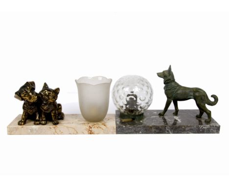 An early 20th Century French table lamp, with a cast metal model of a dog walking, a colourless glass globe, marble base, 24 