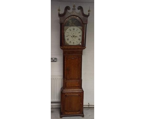 A 19th Century oak mahogany and inlaid longcase clock by Bell of Uttoxeter, eight day movement, arched painted dial with tige